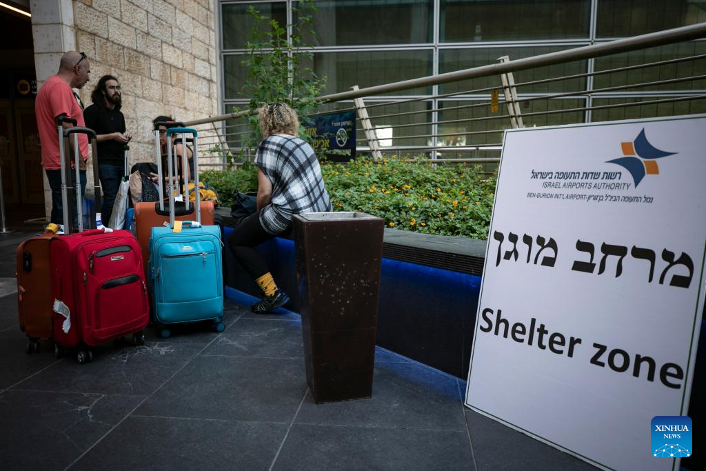 Passengers stranded at Ben Gurion Int'l Airport near Tel Aviv, Israel