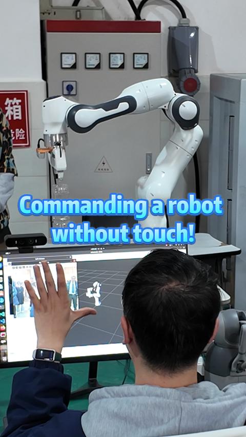 Chinese student commands a robot without touch