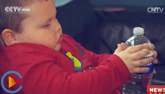 US president visits Flint to promise change