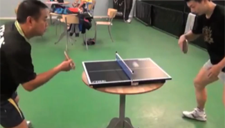 Rare showdown: China's Olympic champions battle it out on mini tennis table